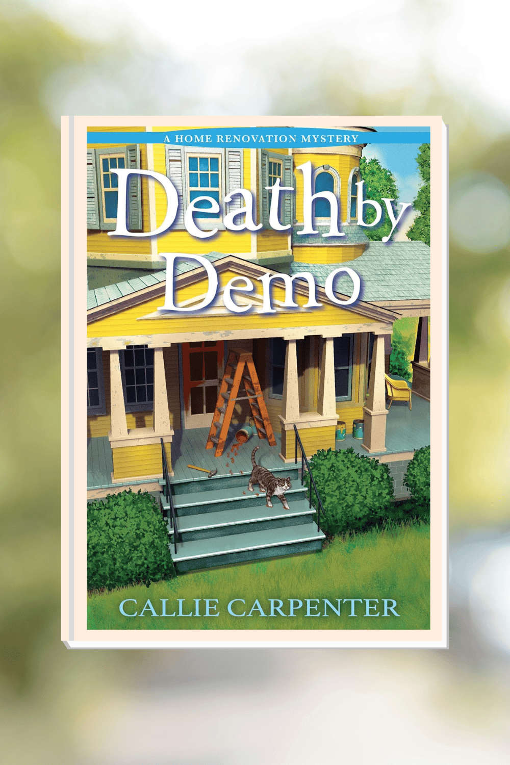 The cover of Death by Demo, A Home Renovation Mystery in front of a blurred park background